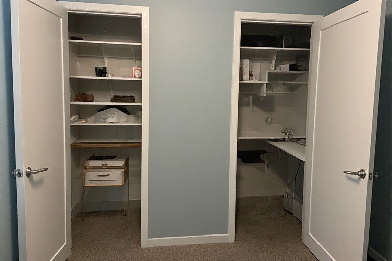 Bedroom closet converted to functional office workspace